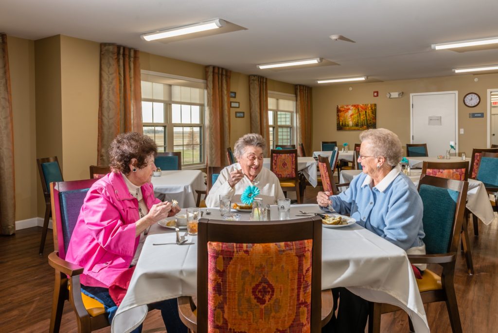 Ladies eating lunch in the dining room