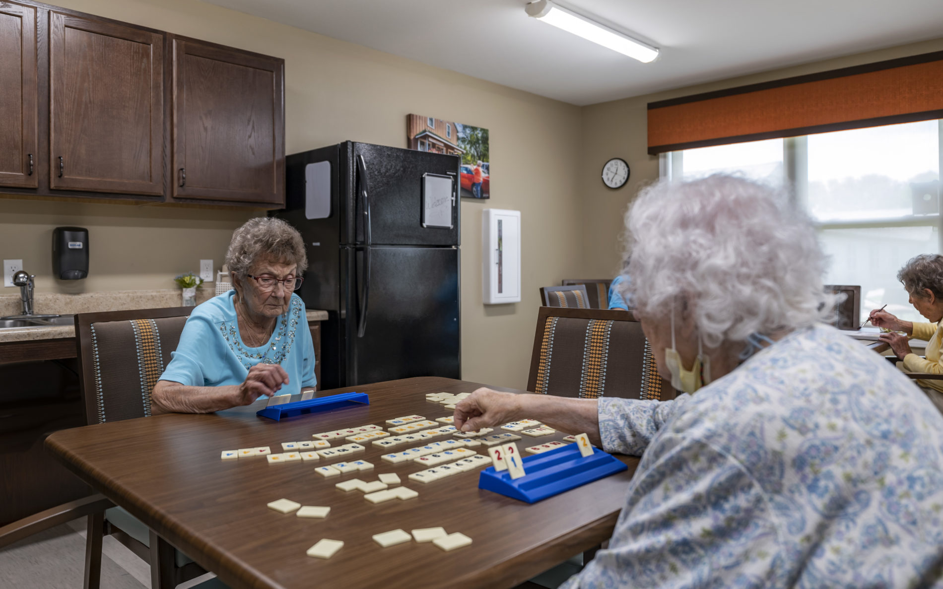 Senior women playing Rummikub